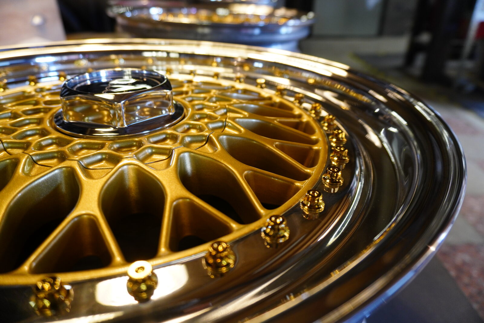 BBS RS 236 refurbished wheel center caps. Gold center, polished lips, gold center caps with polished d center nut